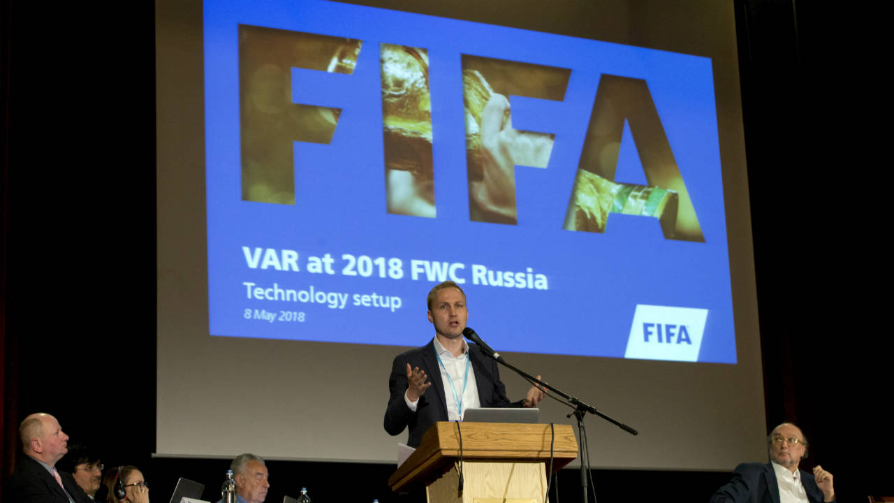 Germany's-Johannes-Holzmueller,-FIFA-Director-of-Soccer-Technology,-speaks-during-a-media-conference-regarding-the-Video-Assistant-Referee-(VAR)-at-a-hotel-in-Brussels-on-Tuesday,-May-8,-2018.-(Virginia-Mayo/AP)