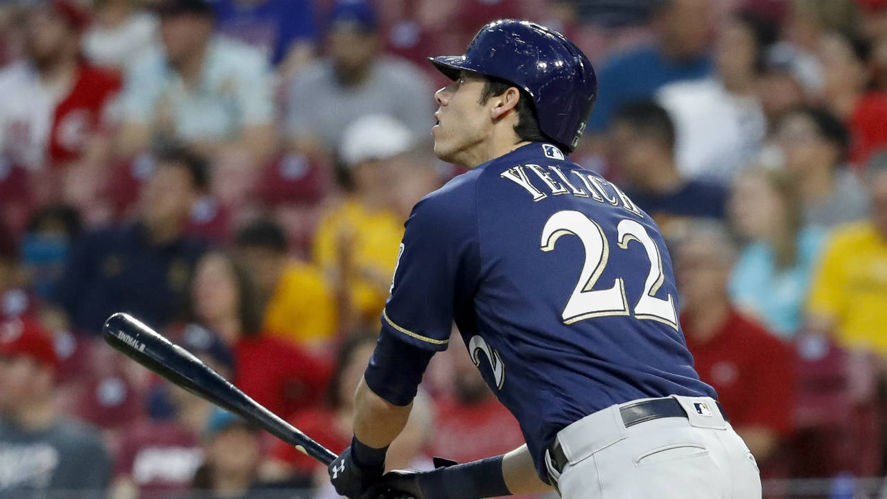 Milwaukee-Brewers'-Christian-Yelich-watches-his-solo-home-run-off-Cincinnati-Reds-starting-pitcher-Luis-Castillo-during-the-fifth-inning-of-a-baseball-game-Wednesday,-May-2,-2018,-in-Cincinnati.-(John-Minchillo/AP)