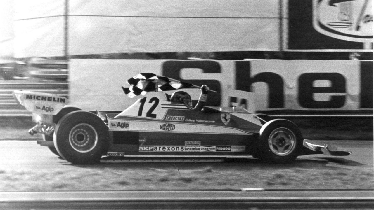 Gilles-Villeneuve-drives-ferrari-car-after-winning-canadian-grand-prix