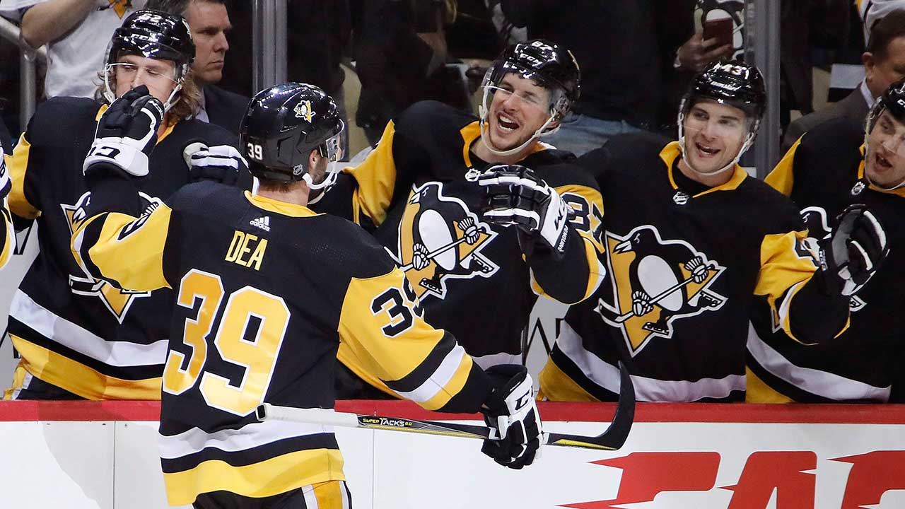 jean-sebastian-dea-celebrates-first-nhl-goal-with-sidney-crosby