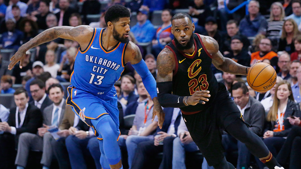 lebron_james_drives_past_paul_george