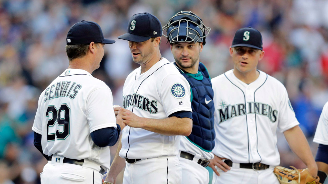 wade-leblanc-hands-ball-to-scott-servais