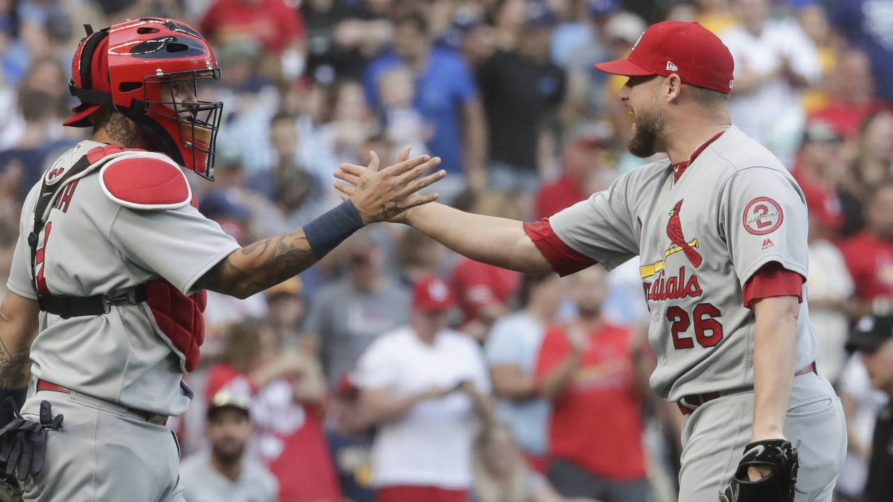 St.-Louis-Cardinals'-Bud-Norris-congratulates-catcher-Yadier-Molina-after-a-baseball-game-against-the-Milwaukee-Brewers-Saturday,-June-23,-2018,-in-Milwaukee.-The-Cardinals-won-3-2.-(Morry-Gash/AP)