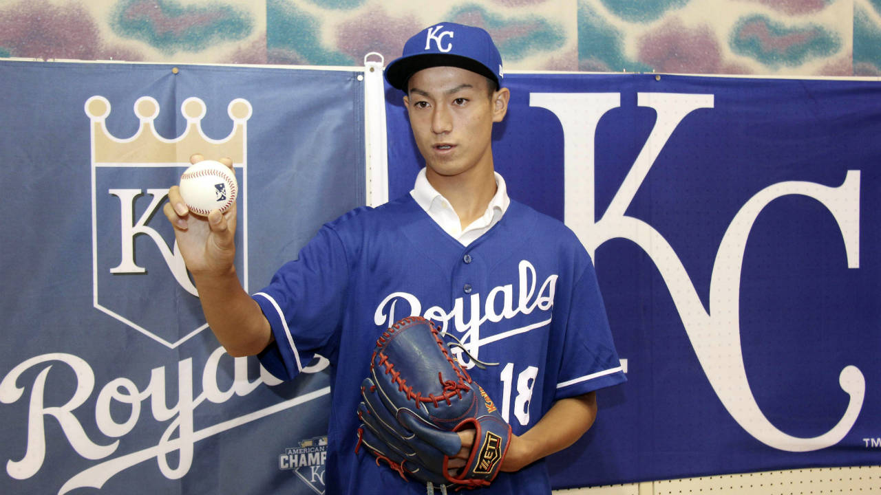 In-this-July-8,-2018-photo,-Kaito-Yuki-poses-for-photographers-at-a-press-conference-in-Osaka,-western-Japan.-Yuki-is-headed-to-the-Kansas-City-Royals-organization-instead-of-attending-high-school-in-Japan.-The-team-signed-Yuki,-a-16-year-old-pitcher,-out-of-junior-high-to-a-standard-seven-year-minor-league-contract-Sunday.-He-is-thought-to-be-the-first-Japanese-junior-high-school-player-to-sign-with-a-major-league-club.