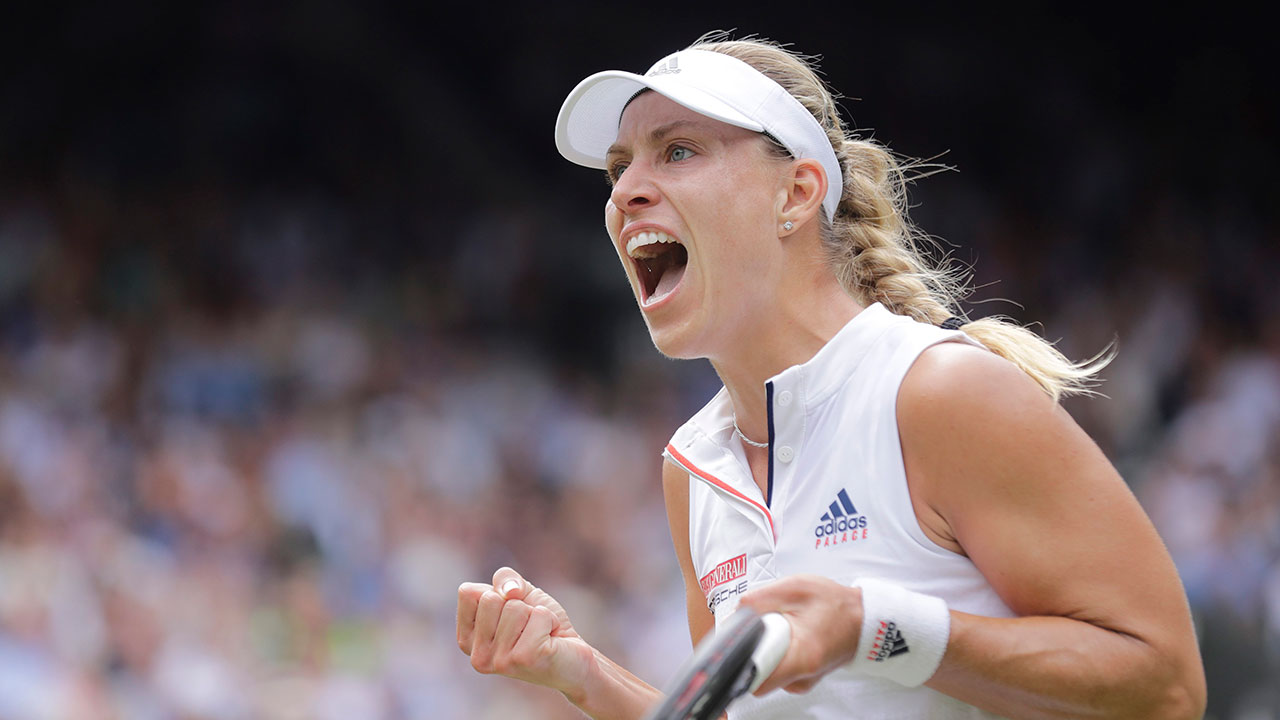Germany's Angelique Kerber celebrates winning a game during her women's singles quarterfinals match against Russia's Daria Kasatkina at Wimbledon. (Ben Curtis/AP)