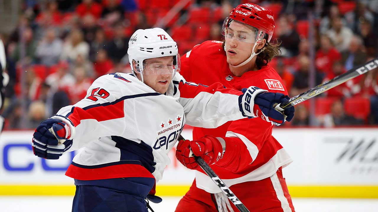 capitals-centre-travis-boyd-collides-with-red-wings-tyler-bertuzzi