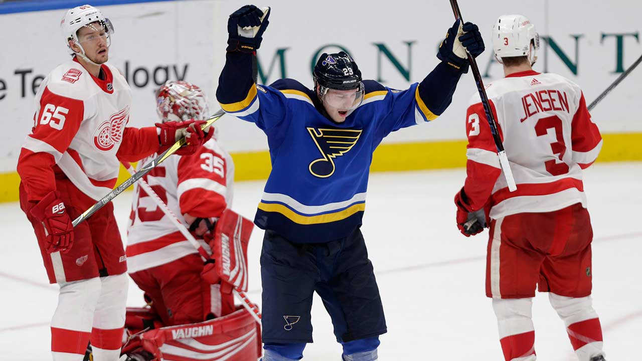 St. Louis Blues' Dmitrij Jaskin (23) celebrates a goal by teammate Alex Pietrangelo as Detroit Red Wings' Jimmy Howard (35), Danny DeKeyser (65) and Nick Jensen (3) react on Wednesday, Feb. 28, 2018 in St. Louis. (Tom Gannam/AP)