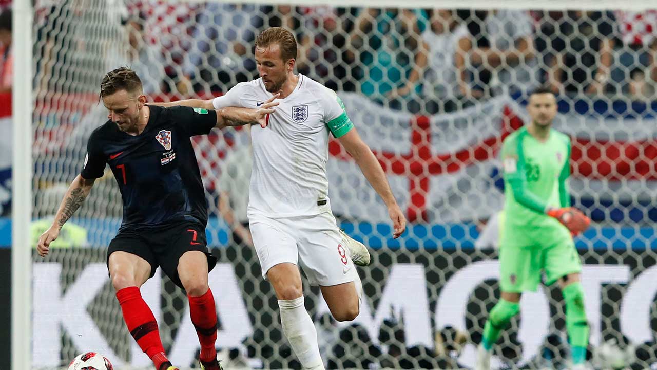 englands-harry-kane-challenges-croatias-ivan-rakitic-at-world-cup
