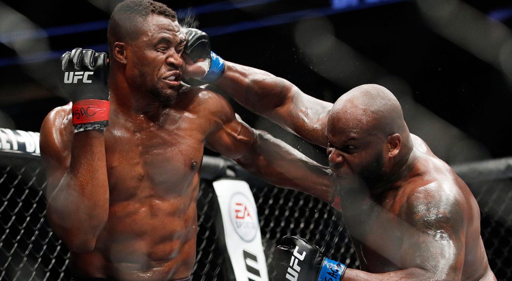francis-ngannou-gets-punched-by-derrick-lewis-ufc-226-1040x572.jpg