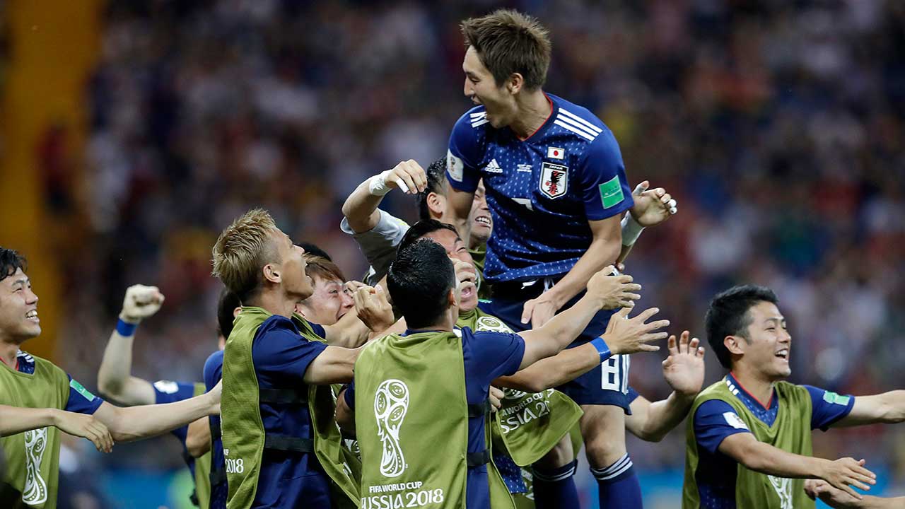 japan-celebrates-scoring-against-belgium