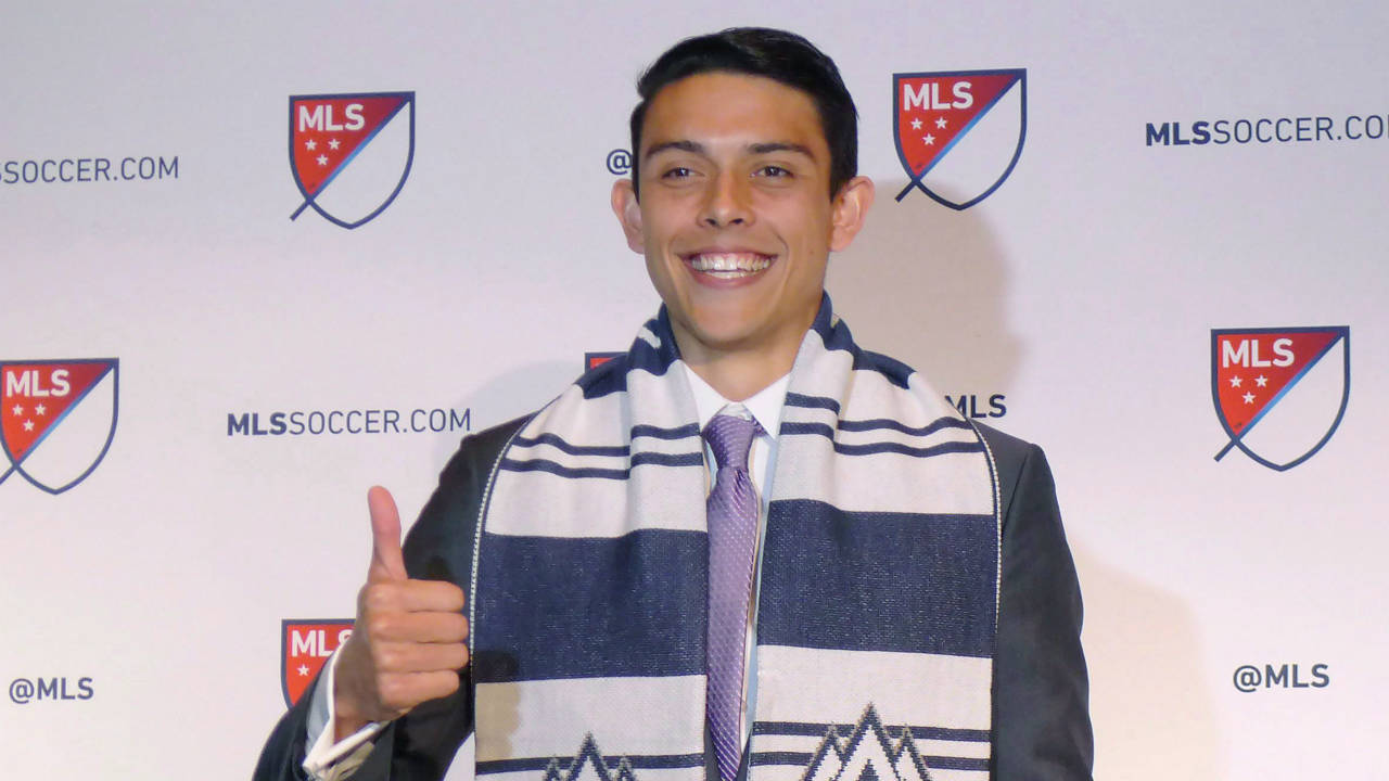 University-of-Washington-defender-Justin-Fiddes-poses-after-being-taken-17th-overall-by-the-Vancouver-Whitecaps-during-the-MLS-SuperDraft-in-Philadelphia-on-Friday,-January-19,-2018.-(Neil-Davidson/CP)