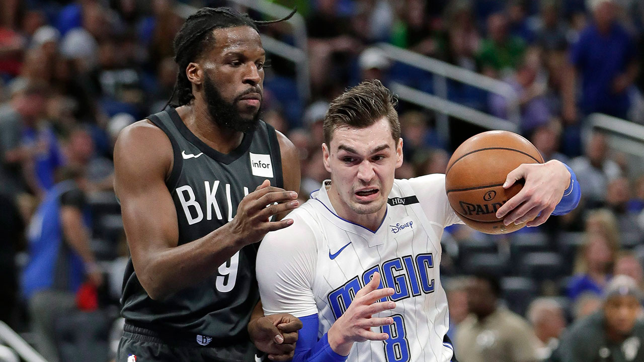 mario_hezonja_drives_past_demarre_carroll