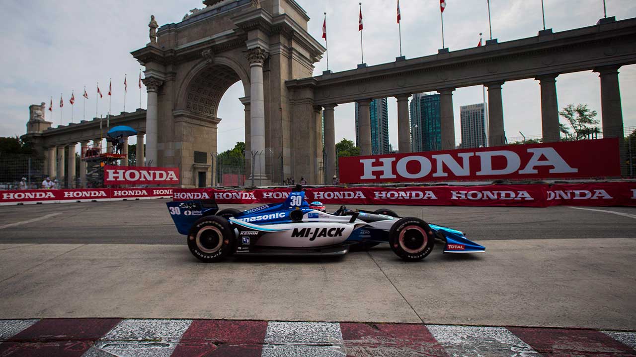 takumo-sato-races-past-princes-gate-at-honda-indy-toronto