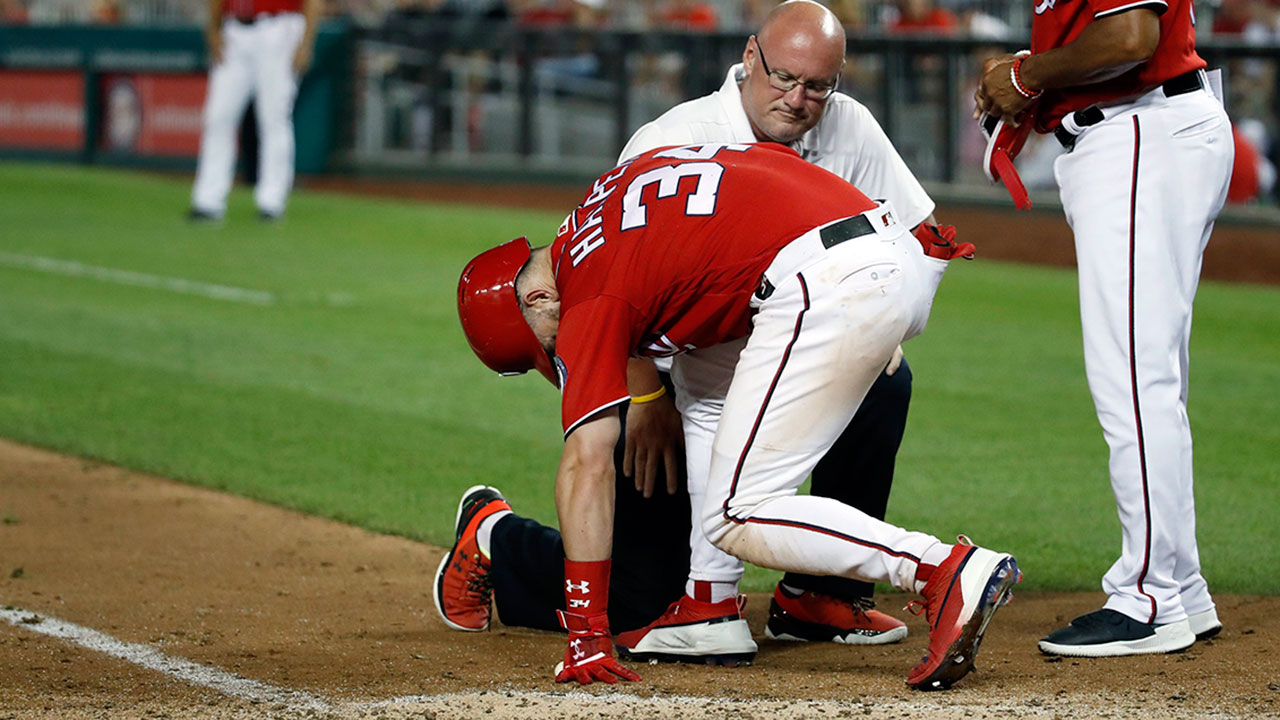 MLB-Nationals-Harper-grimacing-in-pain-after-HBP