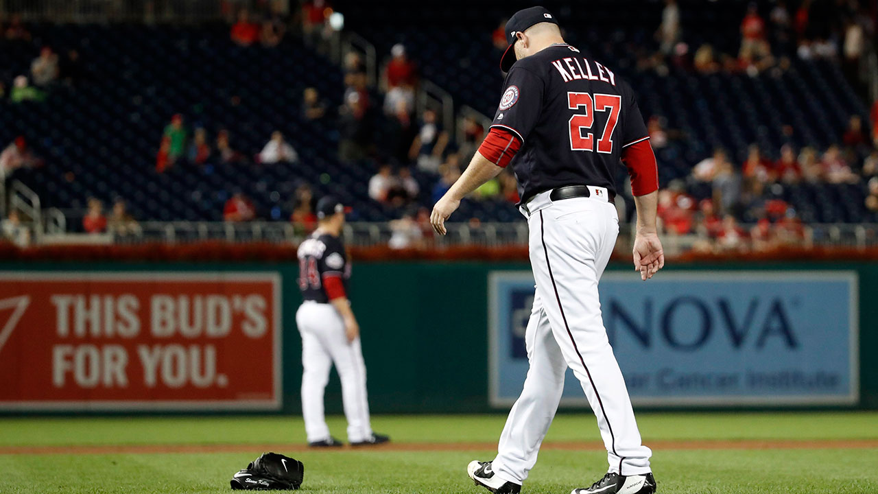 Nationals-reliever-Shawn-Kelley-walks-to-pick-up-glove-against-Mets