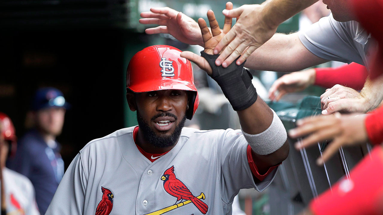 dexter_fowler_celebrates_in_the_dugout