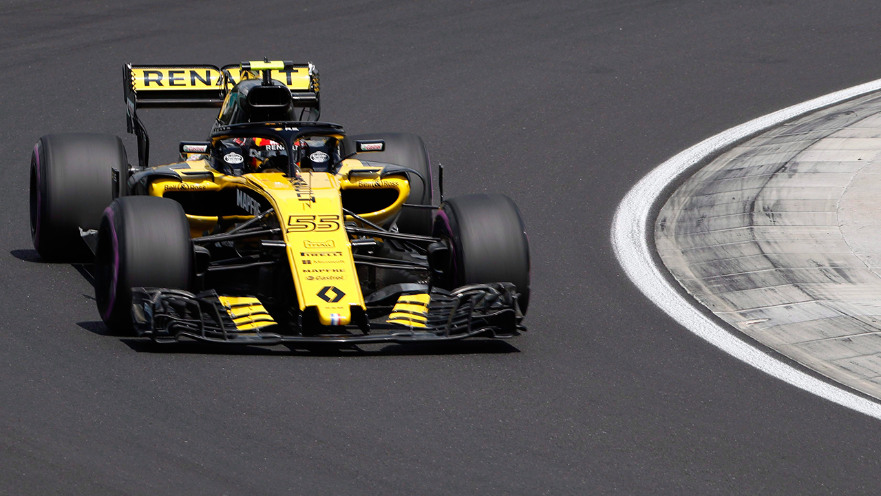 driver-carlos-sainz-steers-during-practice