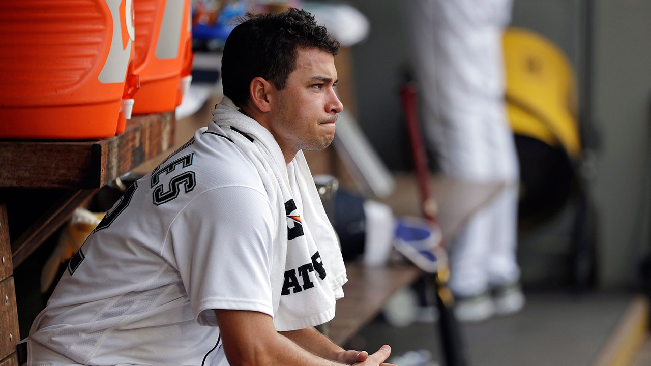 marco_gonzales_sits_in_the_dugout
