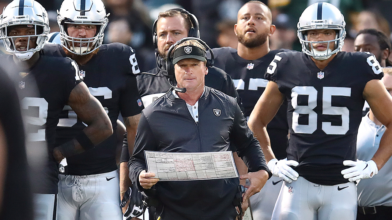 raider-coach-jon-gruden-watches-game-in-first-half