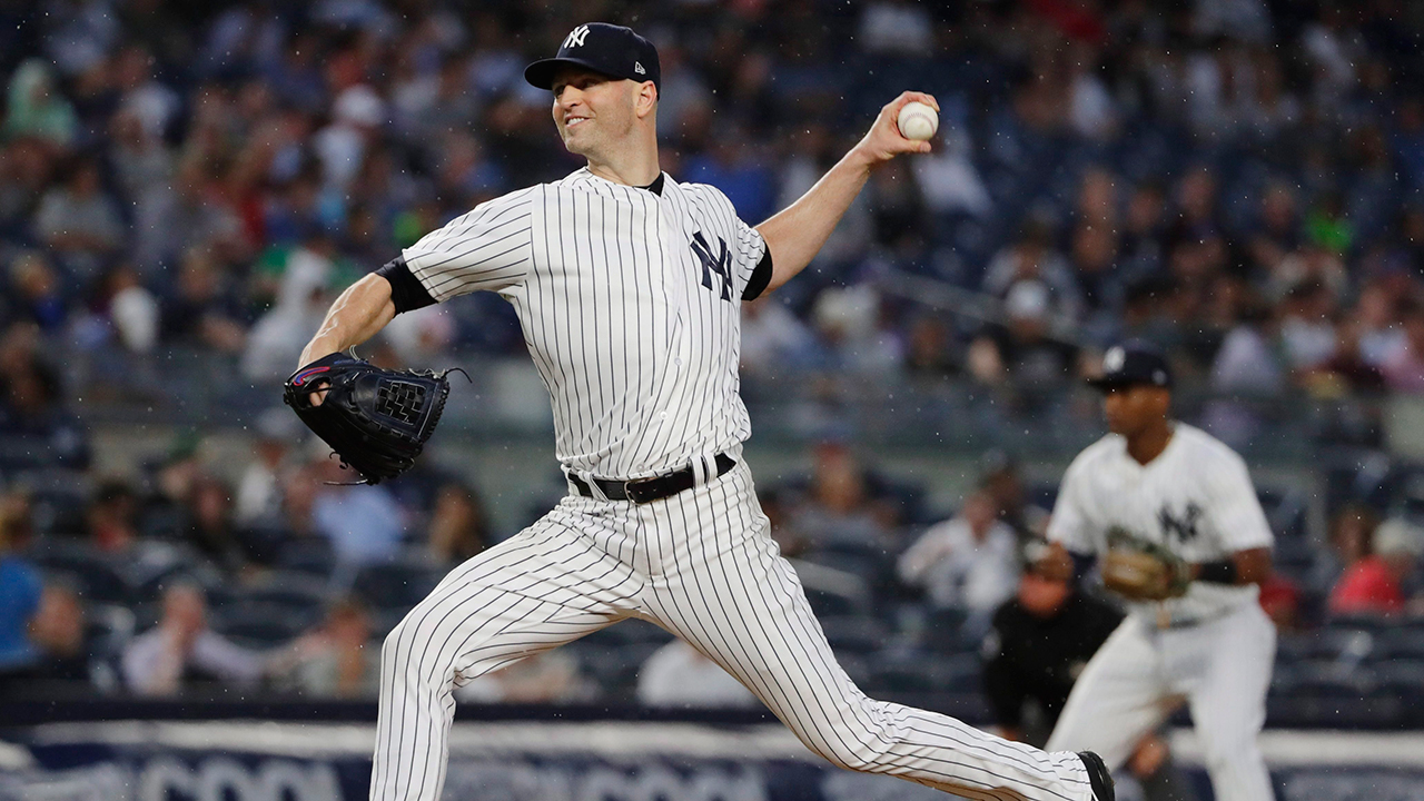 yankees-ja-happ-delivers-pitch-against-rays