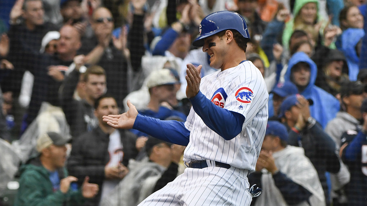 Chicago Cubs' Anthony Rizzo (44) claps after he scored during the third inning of a baseball game against the St. Louis Cardinals on Sunday, Sept. 30, 2018, in Chicago. (AP Photo/Matt Marton)