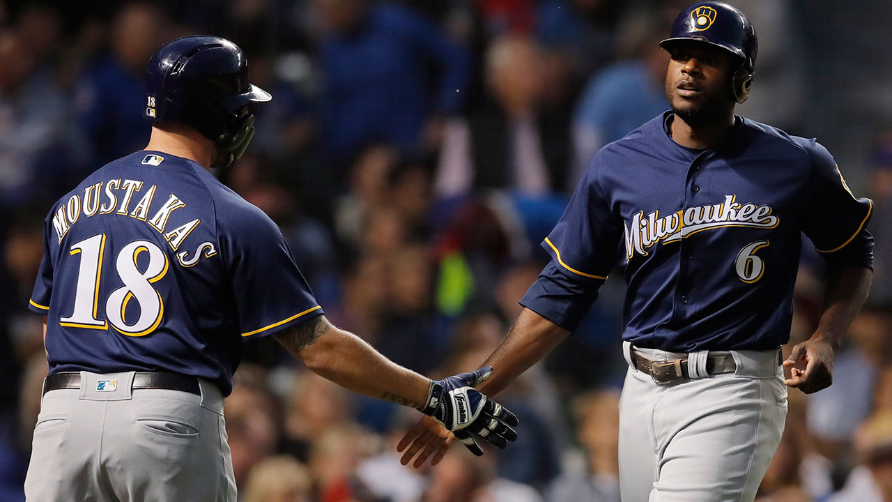 MLB-Brewers-Cain-celebrates-scoring-run-against-Cubs