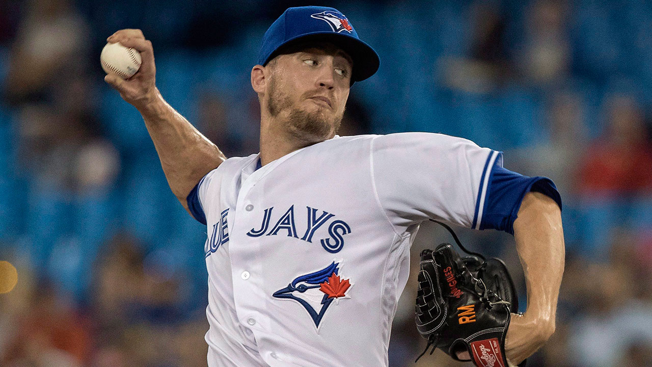 MLB-baseball-Toronto-Blue-Jays-Giles-pitches-against-Red-Sox