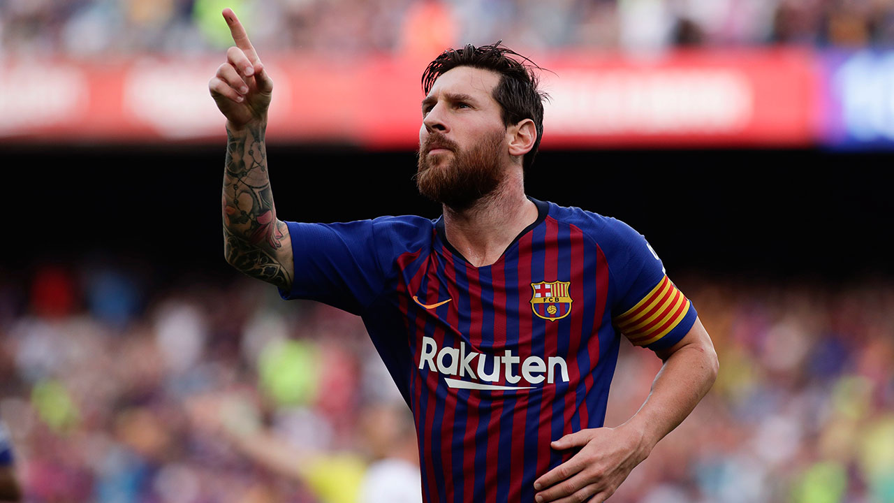 Soccer-Messi-Barcelona-celebrates-goal-against-Huesca