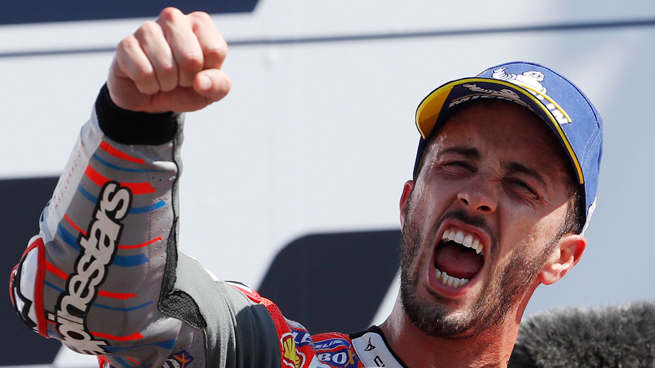 andre_dovizioso-celebrates_his_win_in_san_marino
