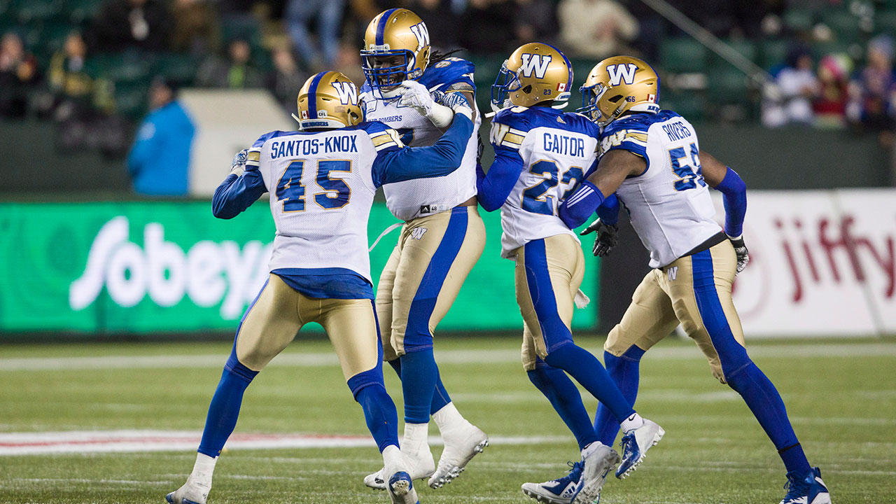 blue_bombers_defence_celebrates_a_sack