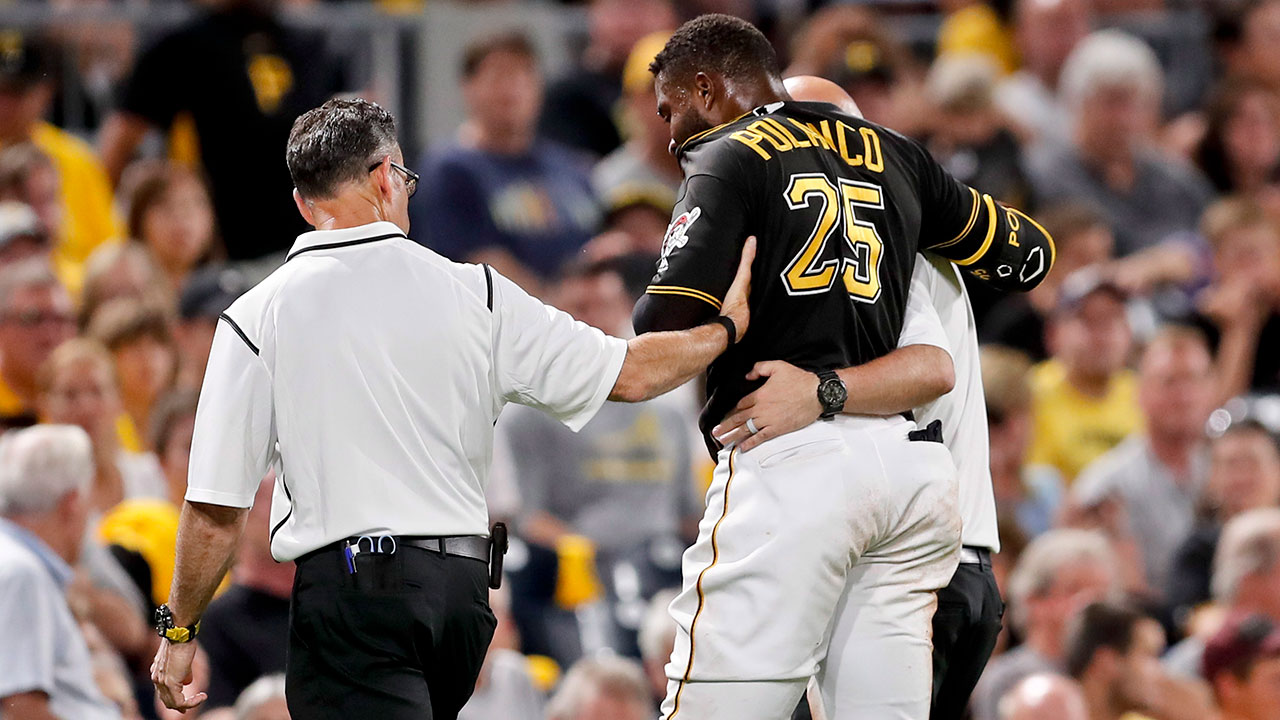 gregory_polanco_is_helped_to_the_dugout