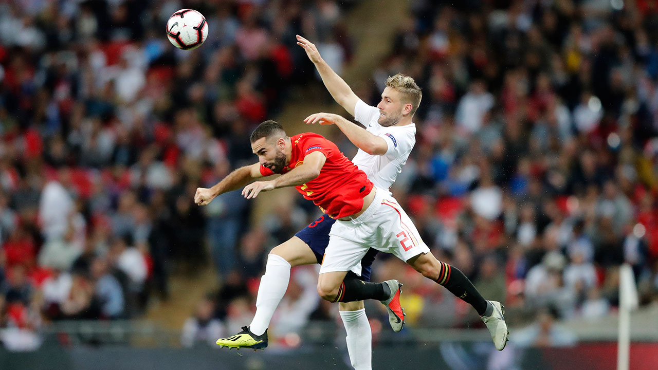 luke_shaw_jumps_for_the_ball_with_dani_carvajal