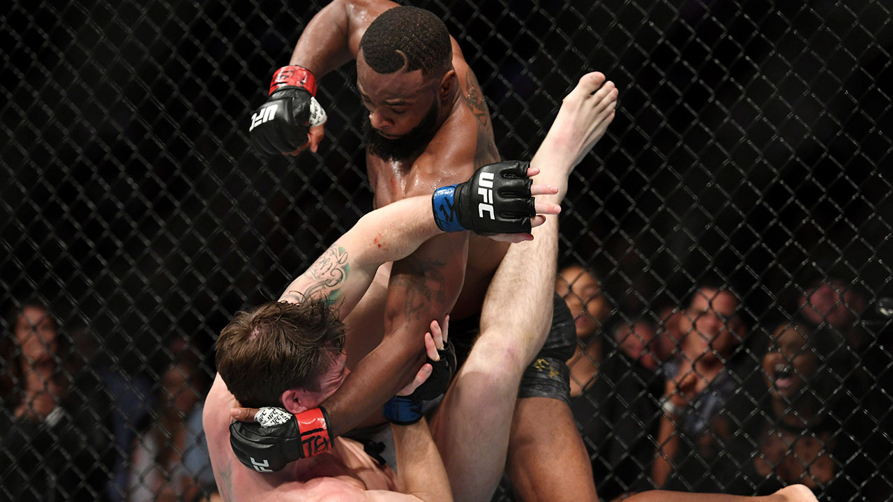 tyron-woodley-punches-darren-till-at-ufc-228