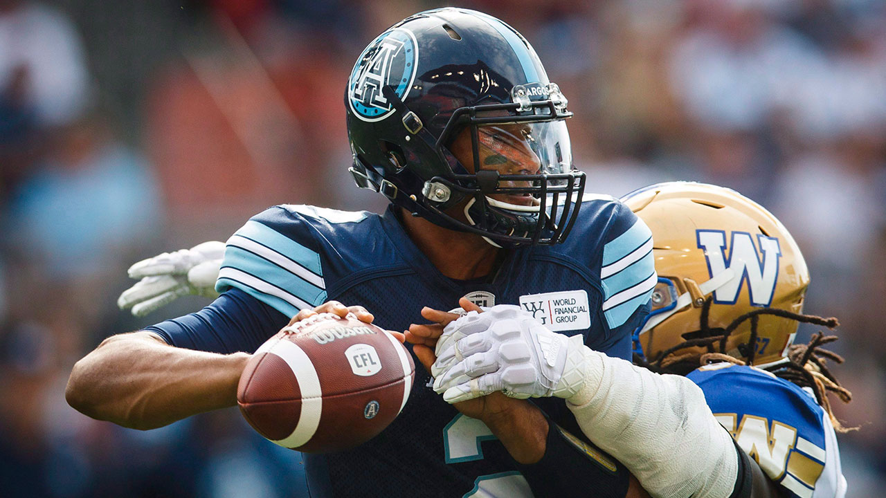 CFL-Argonauts-James-Franklin-gets-tackled-against-Blue-Bombers