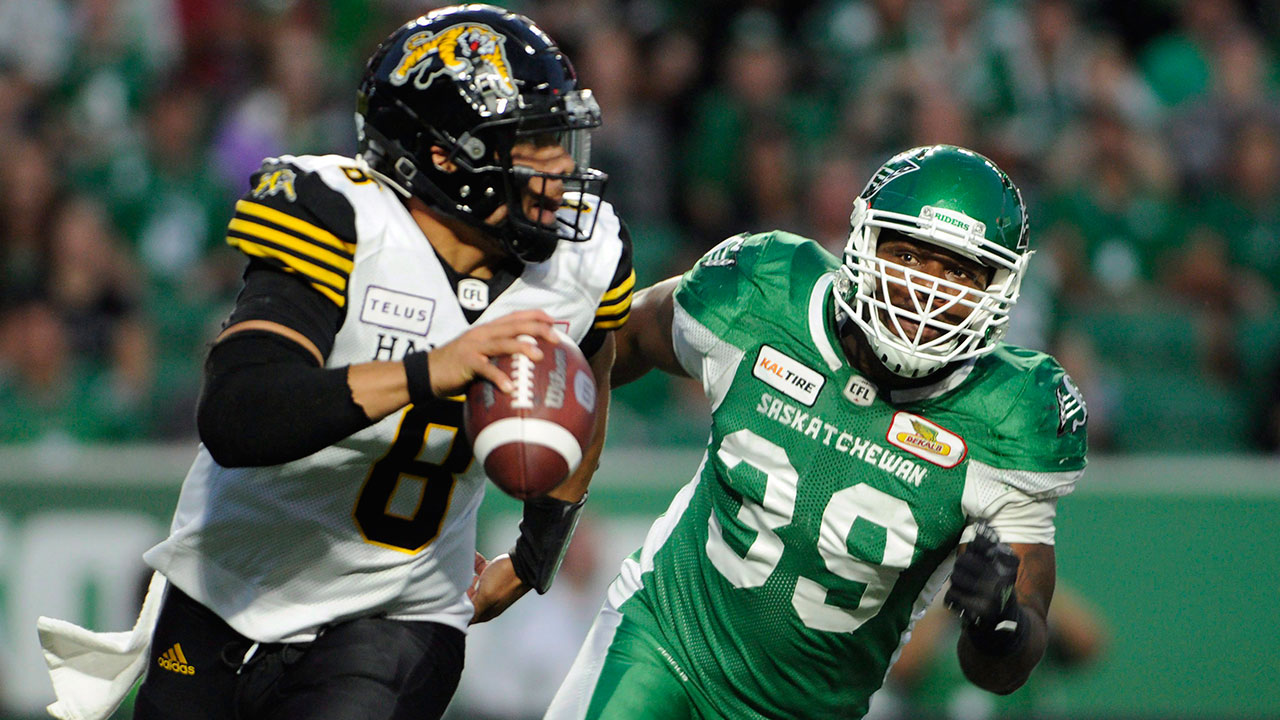 CFL-Roughriders-Hughes-chases-Tigercats-Masoli