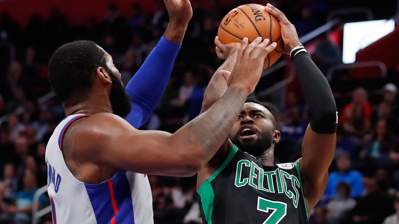 NBA-Brown-shoots-over-Drummond