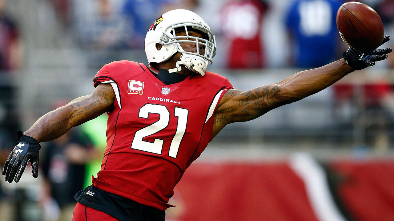 Patrick-Peterson-reaches-out-to-catch-football
