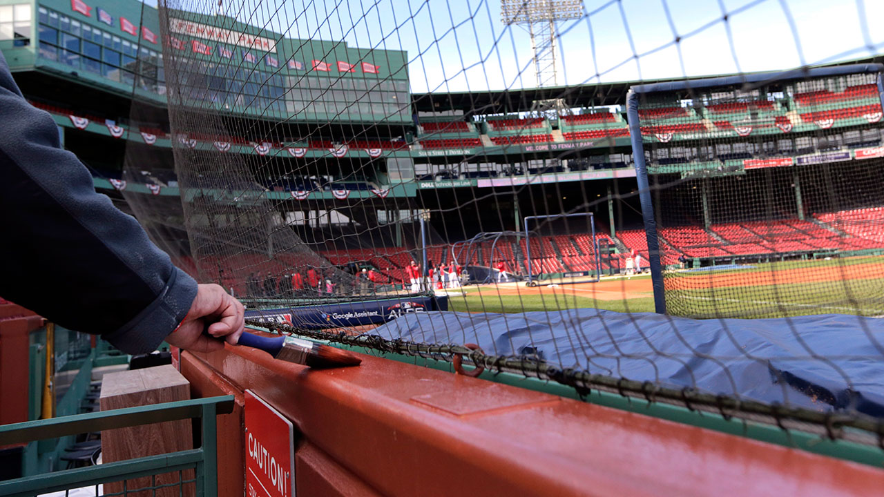 an_employee_works_at_fenway_park