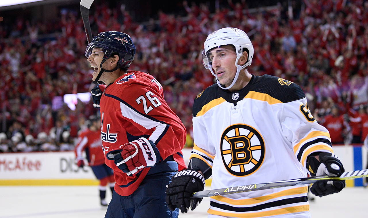 Bruins' Brad Marchand jumps Capitals' Lars Eller down 7-0
