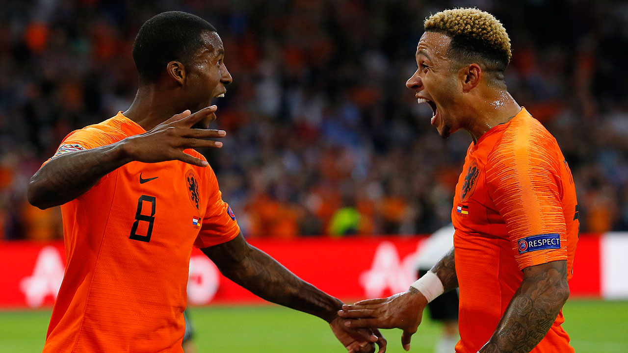 georginio_wijnaldum_celebrates_his_goal_with_memphis_depay