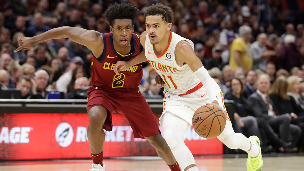 trae_young_drives_past_collin_sexton