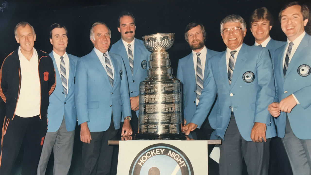 (Left-to-right):-Ralph-Mellanby,-then-executive-producer,-HNIC,-host-Chris-Cuthbert,-play-by-play-man-Don-Wittman,-colour-analyst-John-Davidson,-director-Larry-Brown,-analyst-Howie-Meeker,-associate-producer-Steve-Lansky-and-John-Shannon-at-the-1985-Stanley-Cup-Final-in-Edmonton.