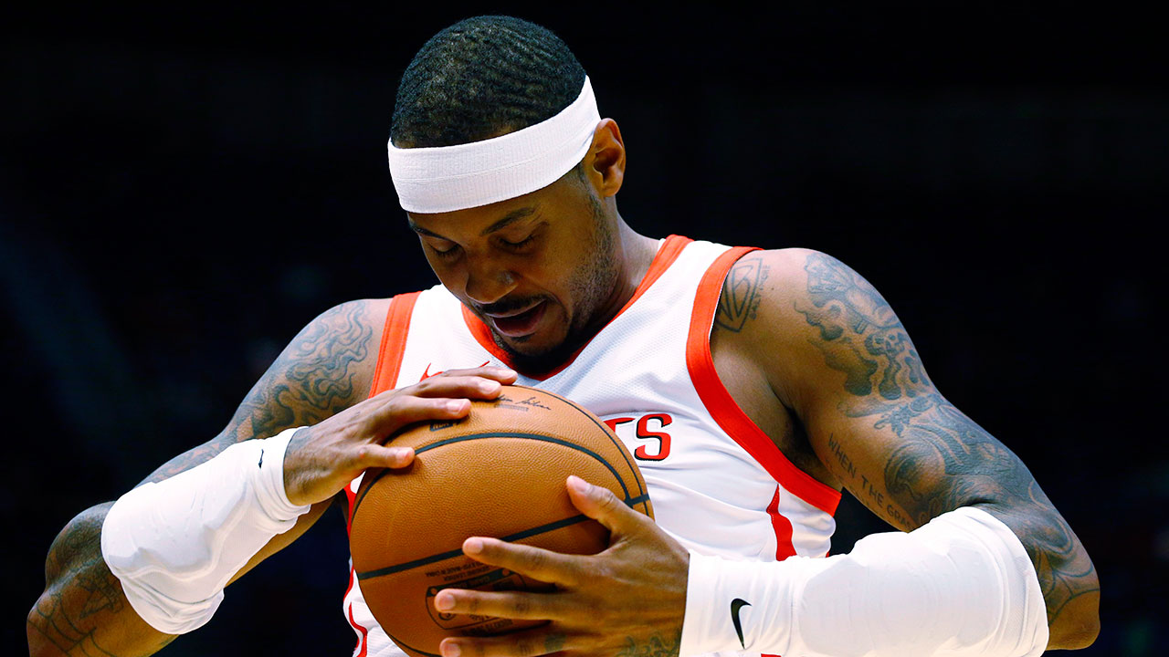 NBA-Rockets-Carmelo-Anthony-palms-ball-at-start-of-game-against-Grizzlies
