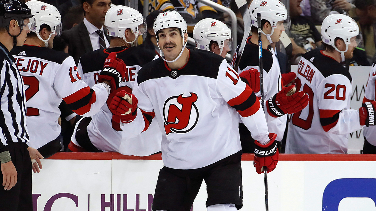 NHL-Devils-Boyle-celebrates-hat-trick