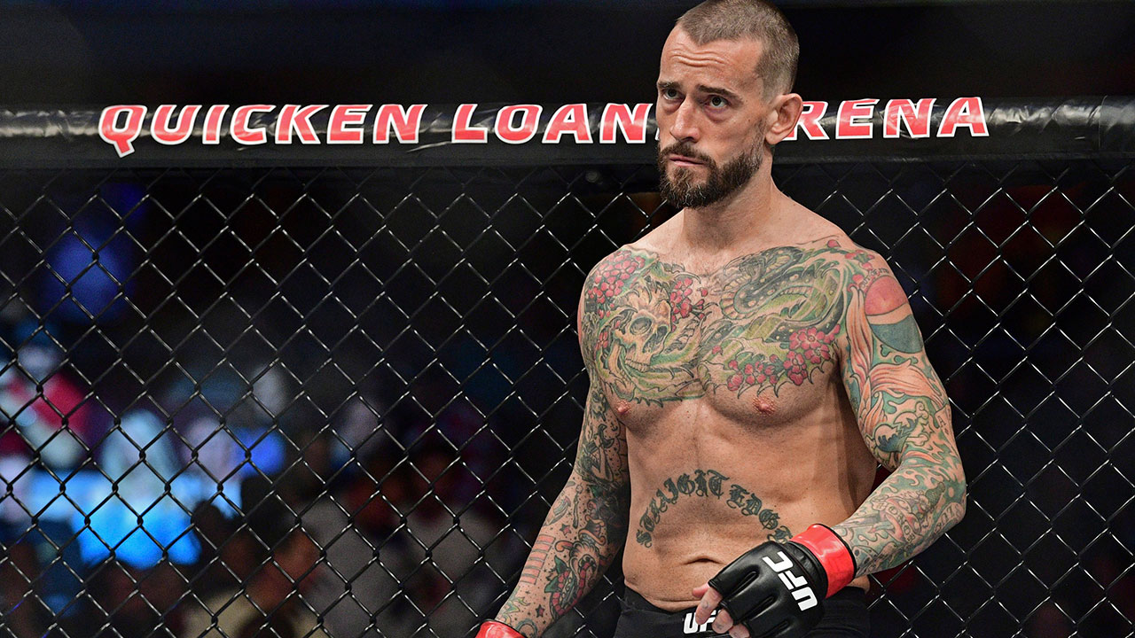cm-punk-stands-in-octagon-before-ufc-fight