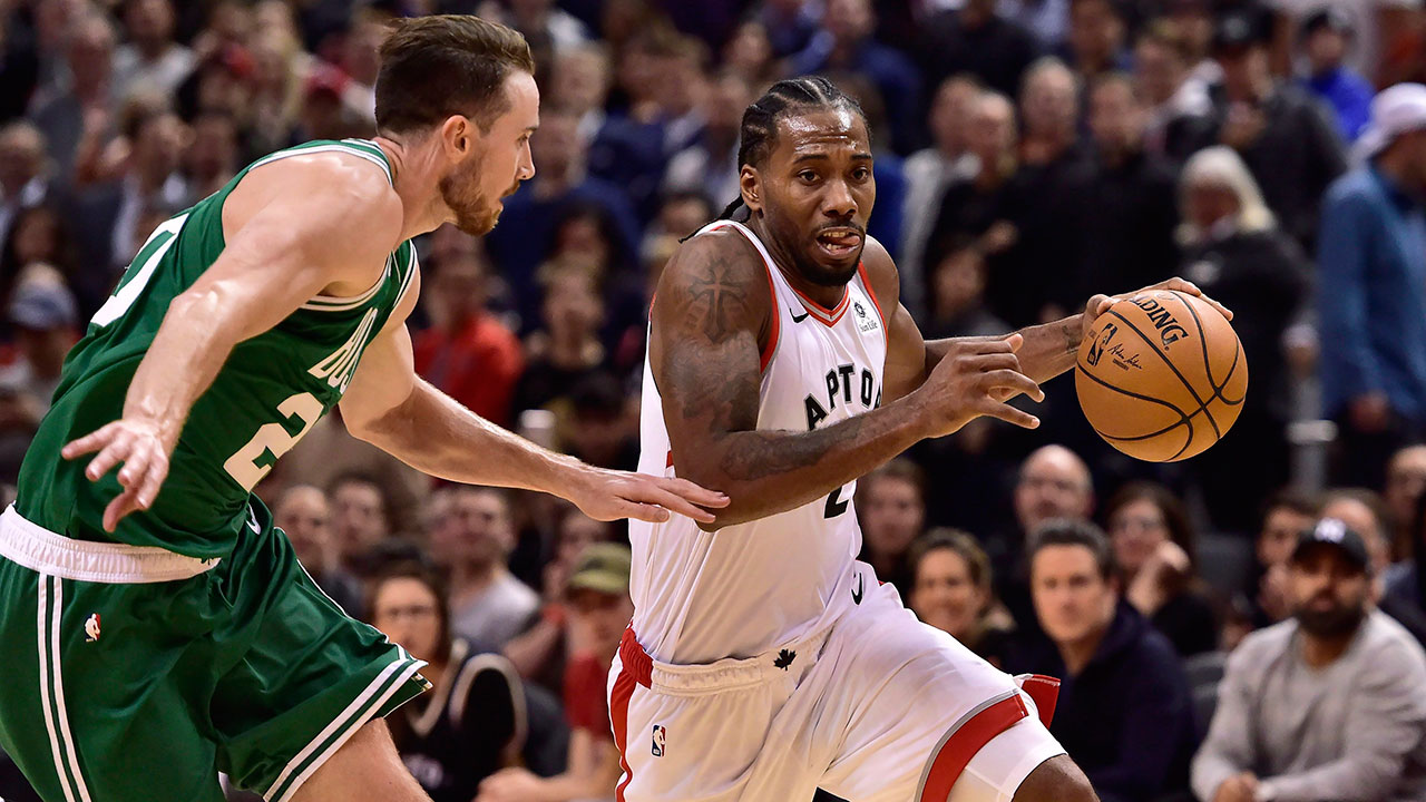 kawhi-leonard-drives-past-gordon-hayward