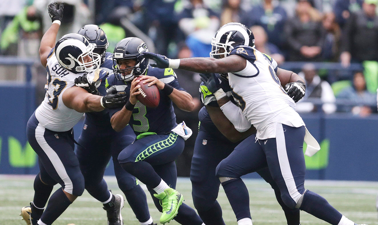 ndamukong-suh-and-michael-brockers-chase-russell-wilson