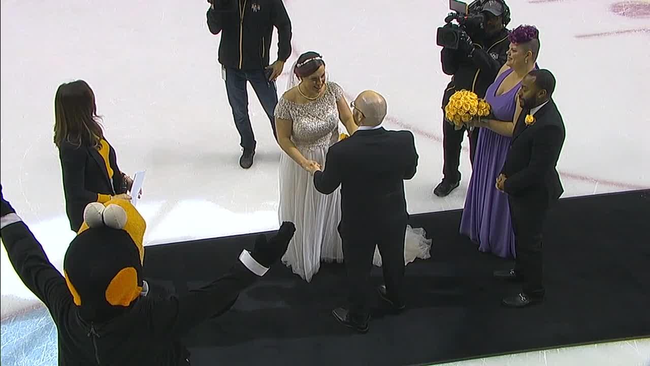 Couple gets married on ice during intermission at 