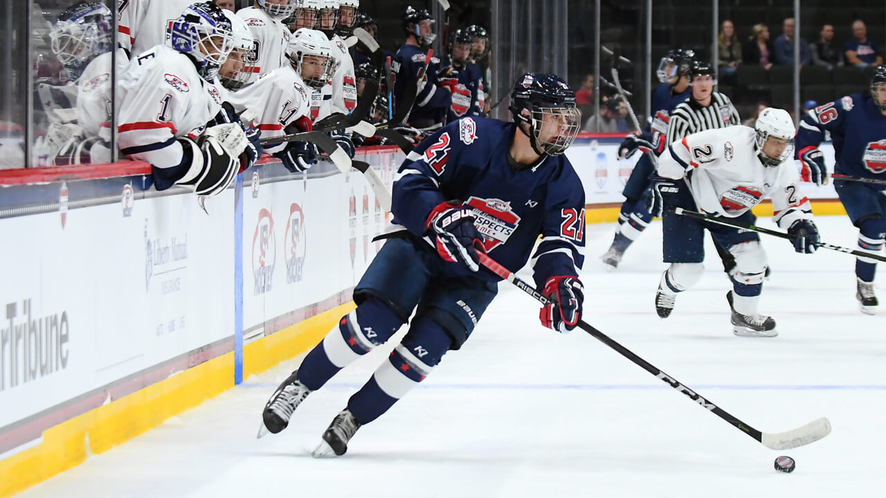 Jack-Hughes-brings-the-puck-up-during-the-USA-Hockey-All-American-Prospects-Game