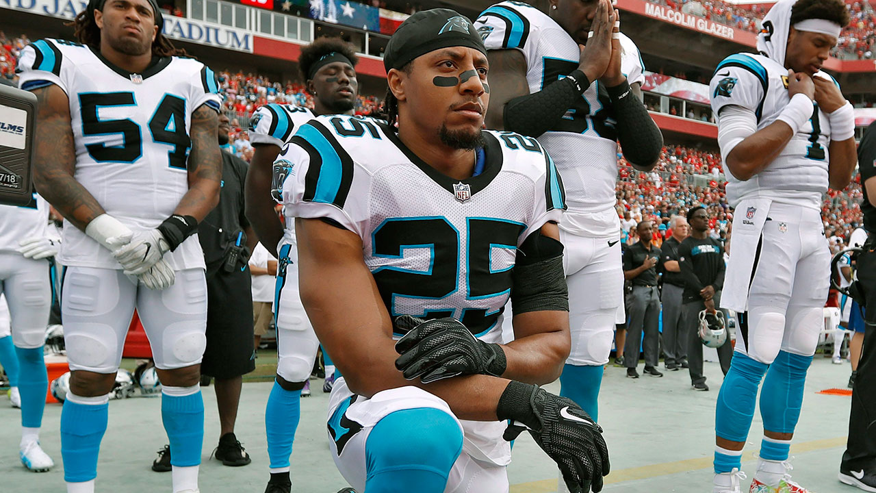 NFL-Panthers-safety-Eric-Reid-kneels-during-anthem